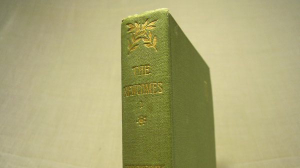 Photograph of the book's head of spine