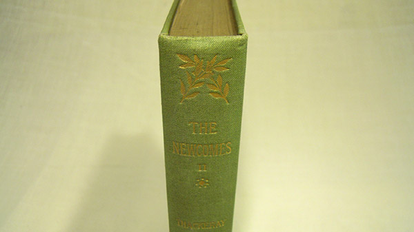 Photograph of the book's head of spine