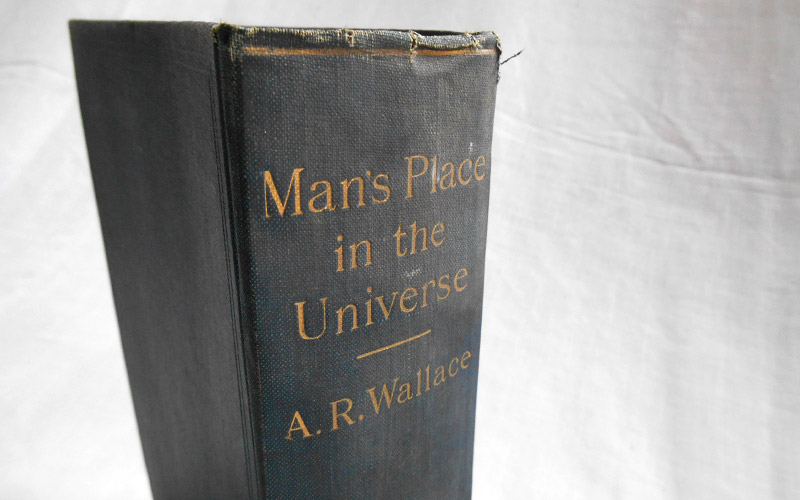 Photography of the Man's Place In The Universe book's spine