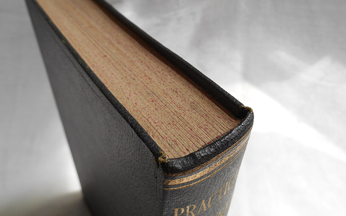 Photograph of the Practical Cabinet Making book's head of spine