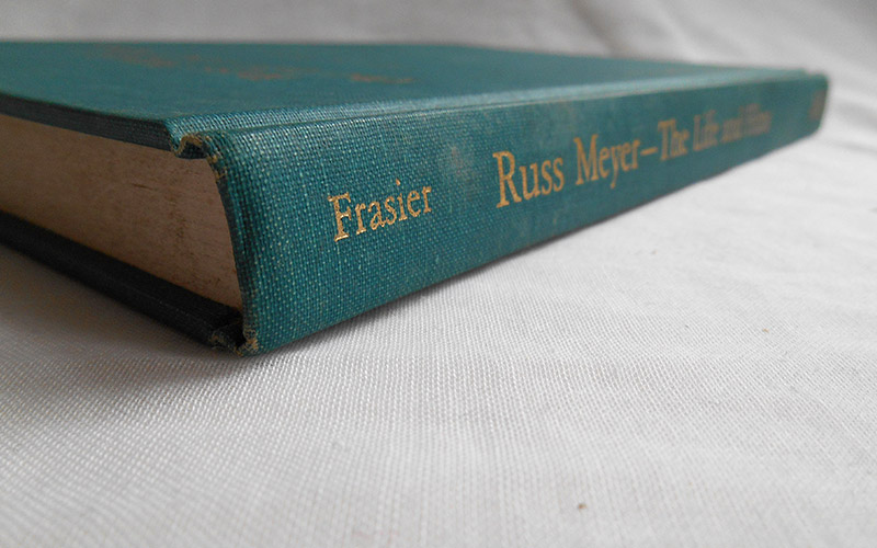 Photograph of the Russ Mayer Life and Films book's spine