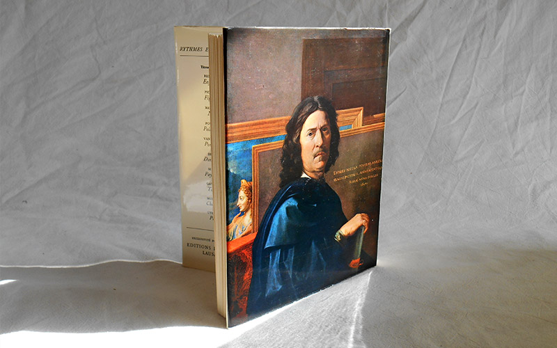 Photograph of the book Les Peintures de Poussin